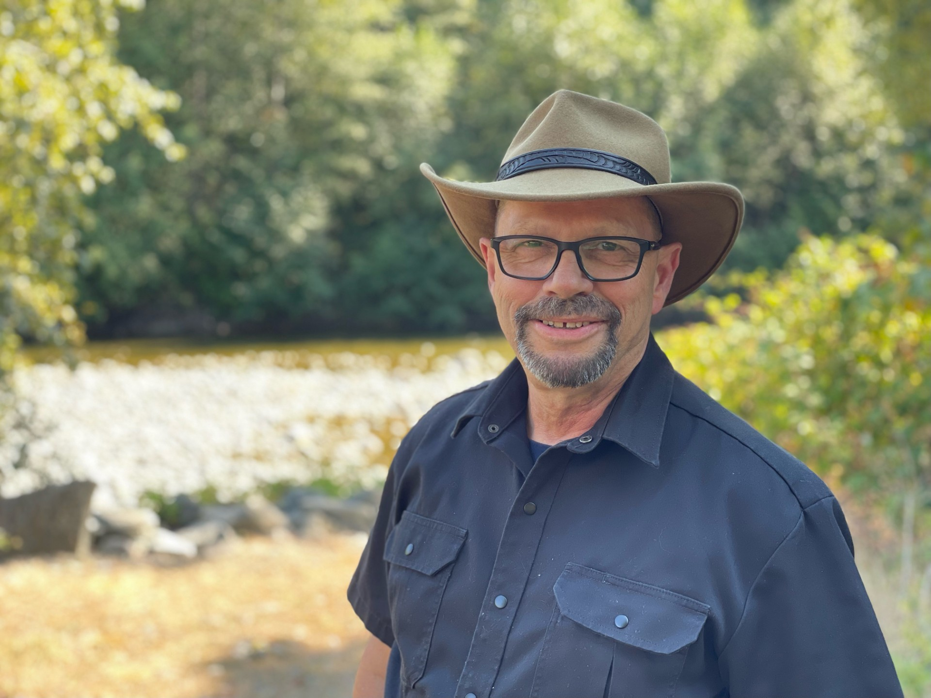 John Rice, Area D director, photographed outdoors in a hat